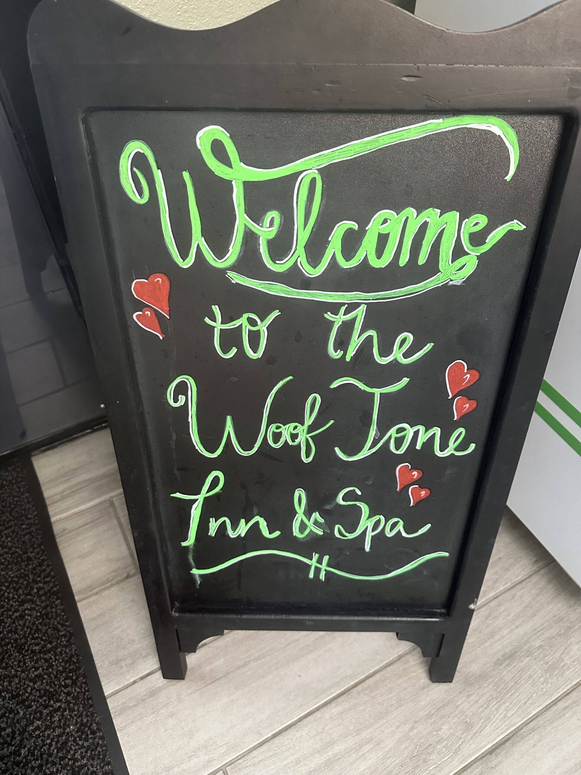 Welcome sign. Woof Tone Inn & Spa